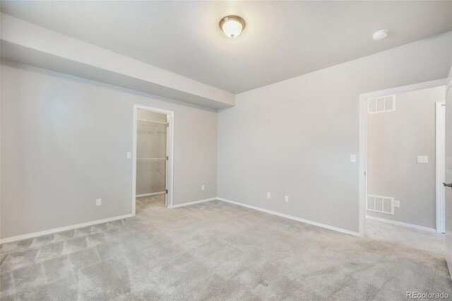 6093 Rowdy Dr, Colorado Springs, CO 80924 - carpeted empty room featuring visible vents and baseboards