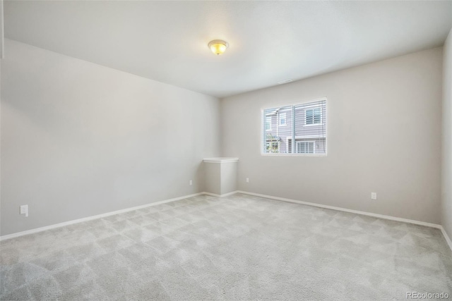 6093 Rowdy Dr, Colorado Springs, CO 80924 - unfurnished room with baseboards and light colored carpet