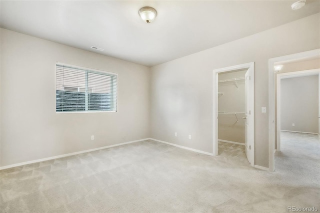 6093 Rowdy Dr, Colorado Springs, CO 80924 - unfurnished bedroom featuring light colored carpet, baseboards, and a spacious closet