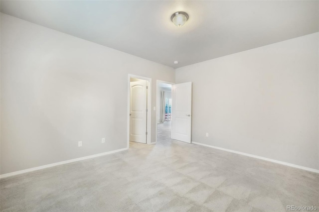 6093 Rowdy Dr, Colorado Springs, CO 80924 - unfurnished bedroom with light colored carpet and baseboards
