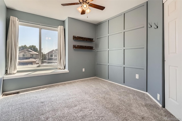 9385 Pepperwood Ln, Highlands Ranch, CO 80126 - carpeted spare room with ceiling fan and baseboards