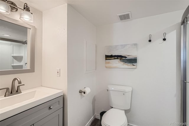 9385 Pepperwood Ln, Highlands Ranch, CO 80126 - bathroom with toilet and vanity