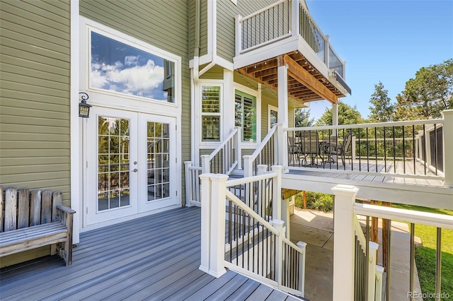 9385 Pepperwood Ln, Highlands Ranch, CO 80126 - wooden deck featuring french doors