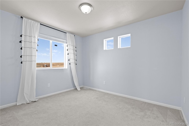 9257 Mayflower Gulch Way, Colorado Springs, CO 80927 - empty room with light carpet and baseboards