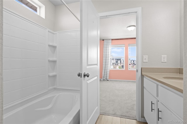 9257 Mayflower Gulch Way, Colorado Springs, CO 80927 - bathroom featuring vanity, bathing tub / shower combination, plenty of natural light, and baseboards