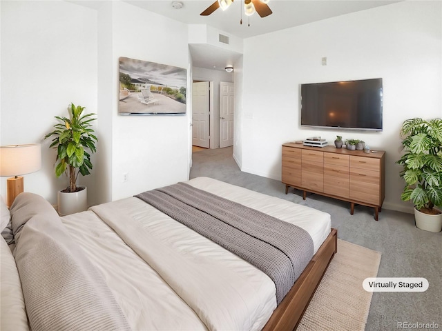 carpeted bedroom with ceiling fan