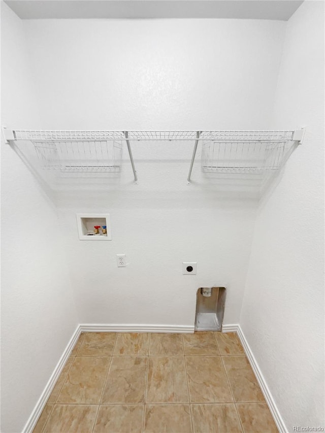 washroom with washer hookup, tile patterned flooring, and hookup for an electric dryer