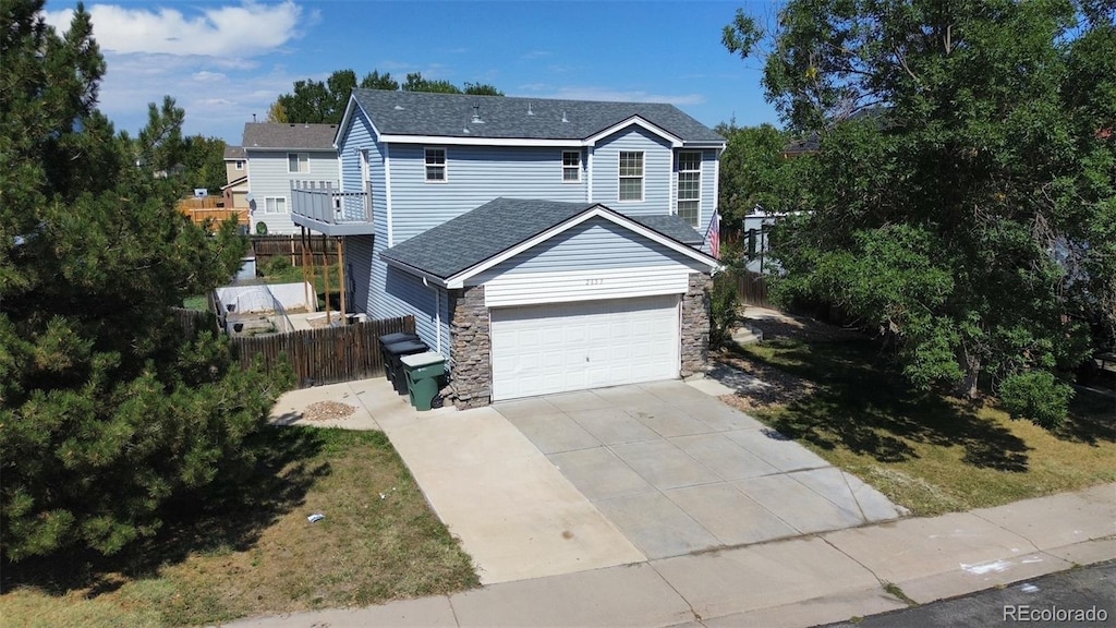 view of front of property featuring a garage