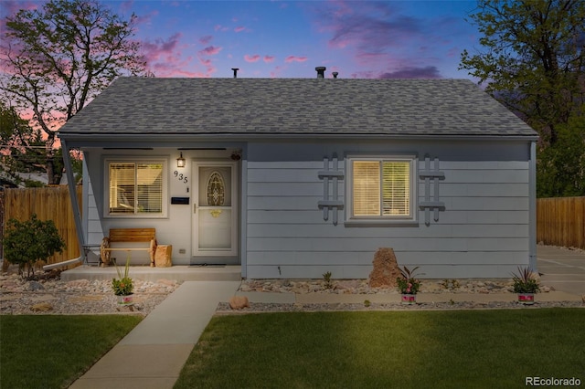 935 Newark St, Aurora, CO 80010 - view of front facade featuring a shingled roof