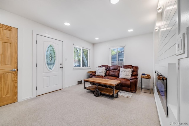 935 Newark St, Aurora, CO 80010 - living room featuring light carpet and recessed lighting