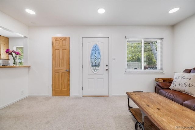 935 Newark St, Aurora, CO 80010 - carpeted foyer with recessed lighting and baseboards