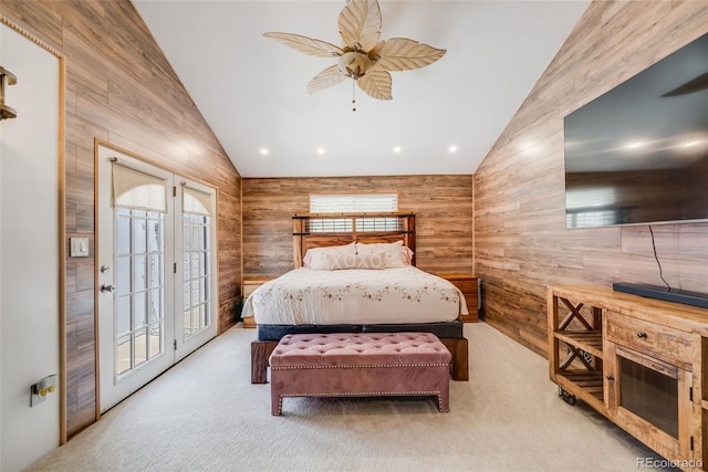 935 Newark St, Aurora, CO 80010 - carpeted bedroom featuring wood walls, a ceiling fan, and high vaulted ceiling
