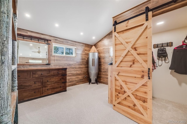 935 Newark St, Aurora, CO 80010 - bedroom featuring carpet, a barn door, recessed lighting, and vaulted ceiling