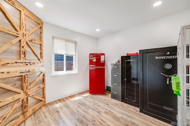 935 Newark St, Aurora, CO 80010 - kitchen with freestanding refrigerator, wood finished floors, and recessed lighting