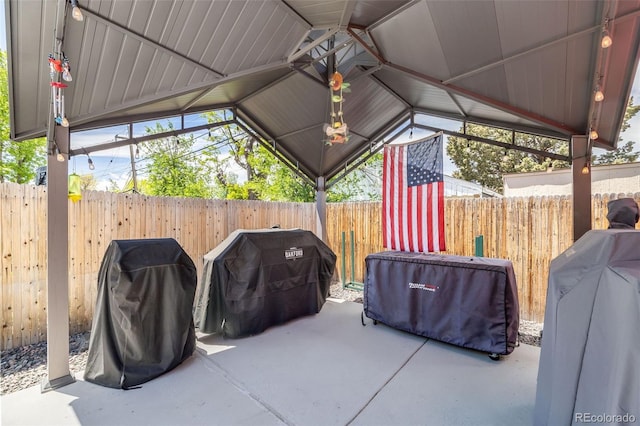 935 Newark St, Aurora, CO 80010 - fenced backyard featuring a patio and grilling area