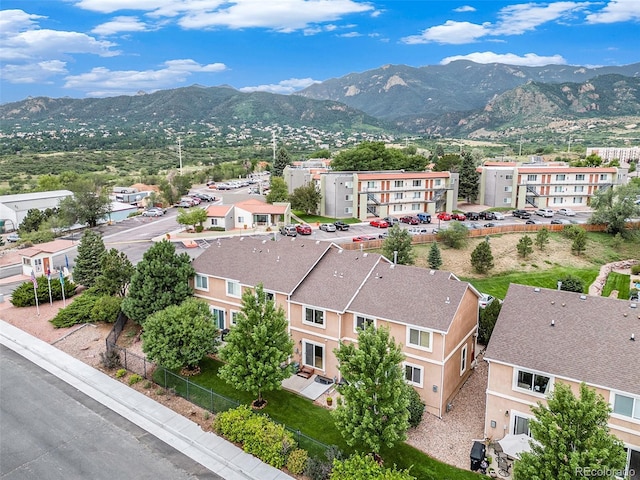 birds eye view of property with a mountain view