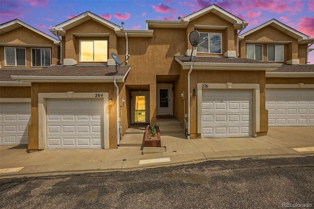 view of property featuring a garage