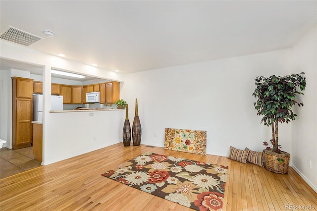 dining space featuring light hardwood / wood-style flooring