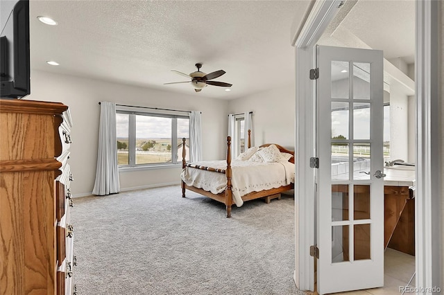 19045 Shiloh Ranch Dr, Colorado Springs, CO 80908 - bedroom featuring carpet, recessed lighting, a textured ceiling, baseboards, and a ceiling fan