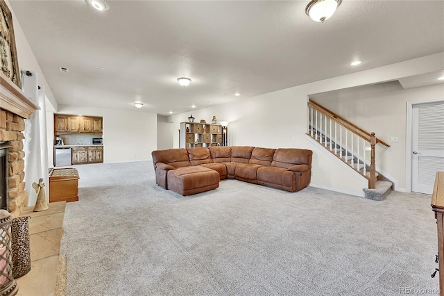 19045 Shiloh Ranch Dr, Colorado Springs, CO 80908 - living area featuring light carpet, stairway, a stone fireplace, recessed lighting, and baseboards