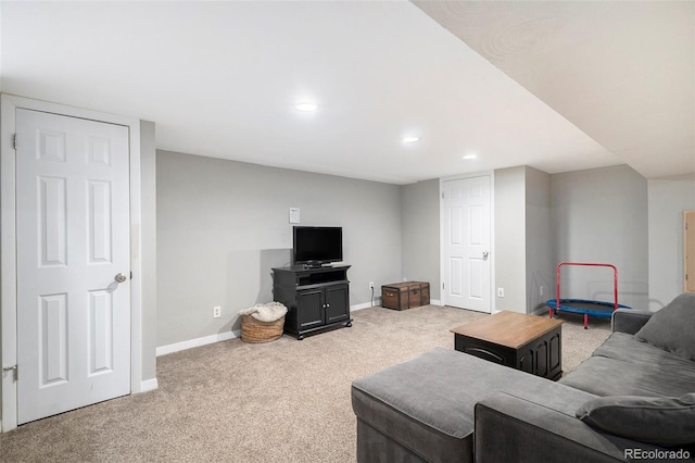 carpeted living room with baseboards and recessed lighting