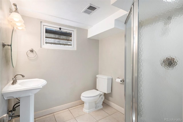 bathroom with visible vents, tile patterned flooring, toilet, baseboards, and a shower stall
