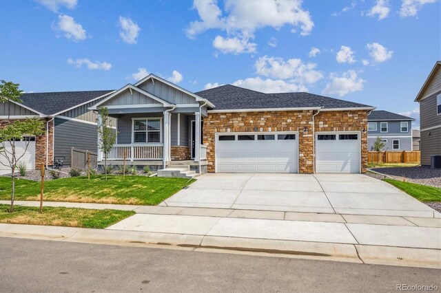 1144 Ridgefield Dr, Berthoud, CO 80513 - craftsman house with stone siding, board and batten siding, and a porch
