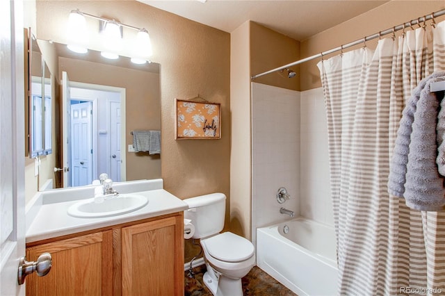 full bathroom featuring shower / tub combo, vanity, and toilet