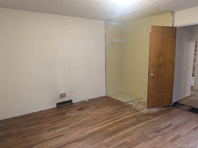 4209 Perry St, Denver, CO 80212 - spare room featuring wood finished floors