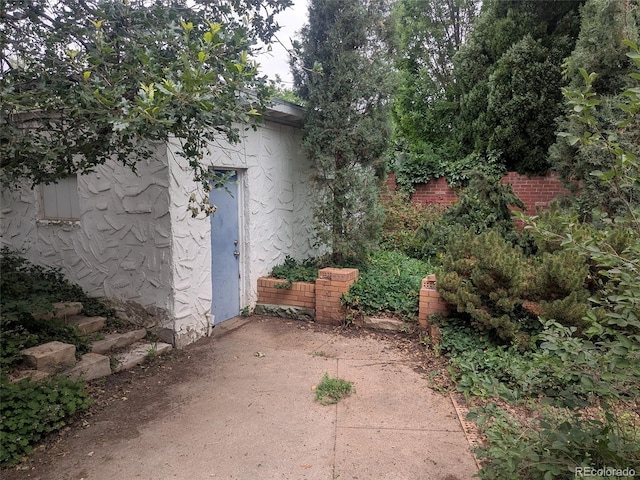 4209 Perry St, Denver, CO 80212 - entrance to property featuring a patio area and stucco siding