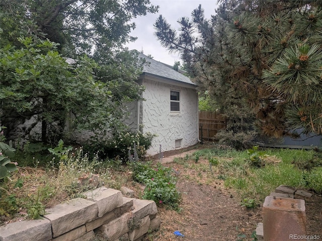 4209 Perry St, Denver, CO 80212 - view of property exterior featuring roof with shingles