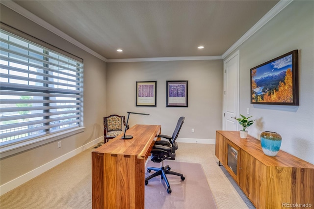 carpeted home office featuring ornamental molding