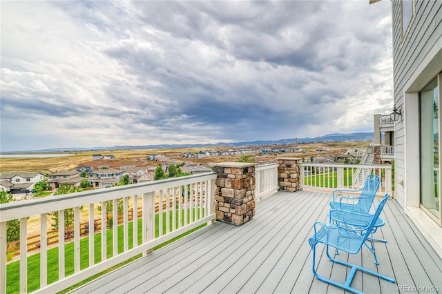 wooden terrace with a mountain view