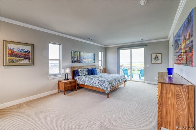 bedroom featuring access to exterior, carpet floors, ornamental molding, and multiple windows