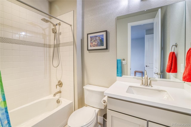 full bathroom with shower / bath combo, vanity, and toilet