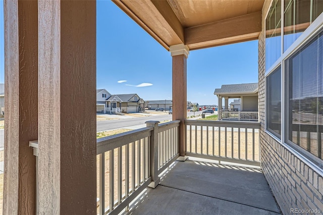 balcony featuring a residential view