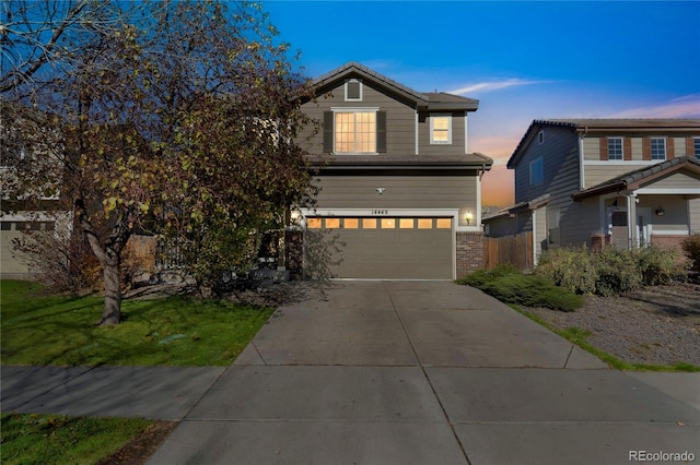 view of front of home with a garage