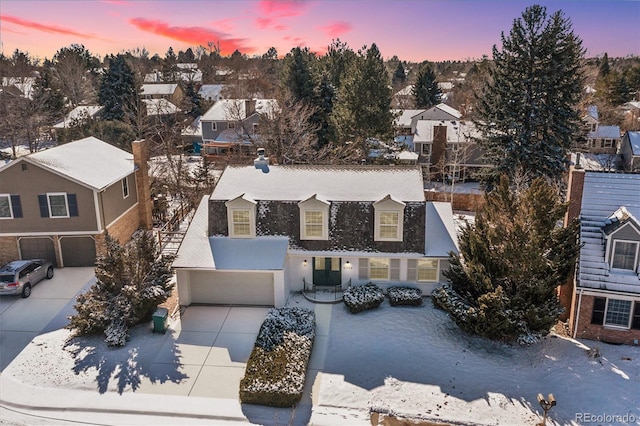 birds eye view of property with a residential view