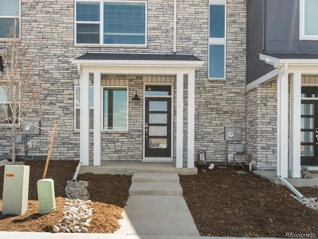 22360 E 8th Ave, Aurora, CO 80018 - property entrance with stone siding
