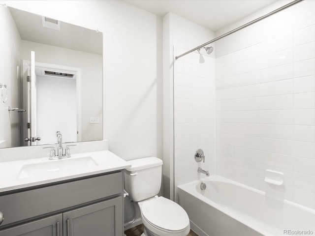 22360 E 8th Ave, Aurora, CO 80018 - full bath with visible vents, toilet, vanity, and shower / bathtub combination