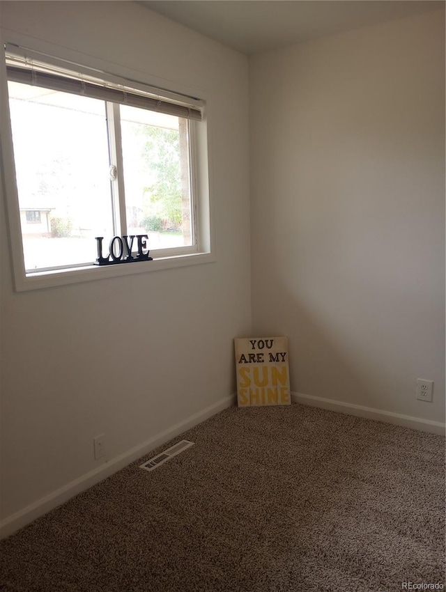 5640 E 67th Pl, Commerce City, CO 80022 - unfurnished room featuring baseboards, visible vents, and carpet