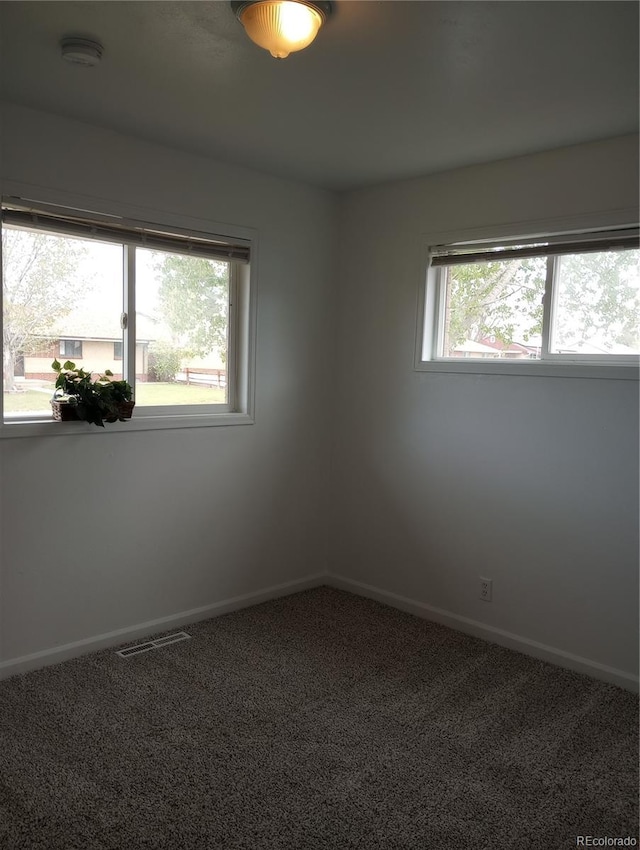 5640 E 67th Pl, Commerce City, CO 80022 - carpeted empty room featuring baseboards and visible vents