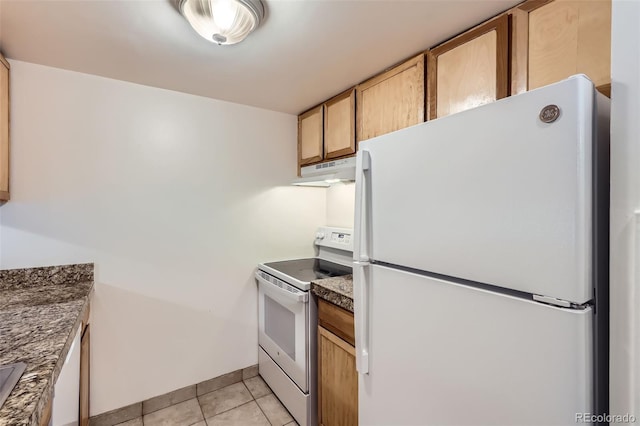 1265 Elizabeth St Unit 207, Denver, CO 80206 - kitchen with white appliances, under cabinet range hood, and light tile patterned flooring