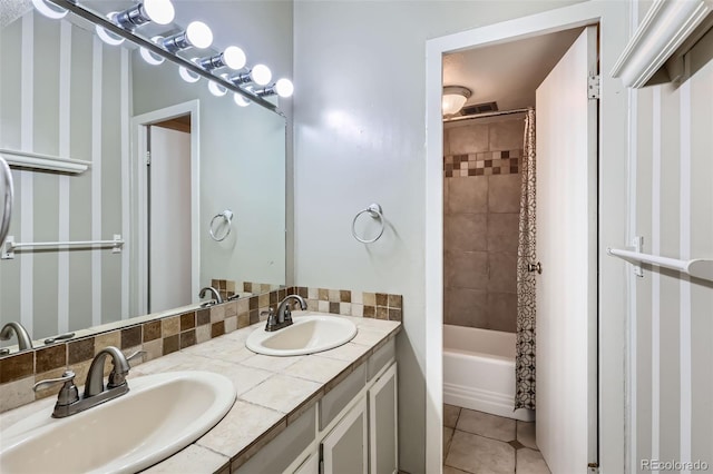 1265 Elizabeth St Unit 207, Denver, CO 80206 - bathroom featuring double vanity, shower / bath combination, and tile patterned flooring
