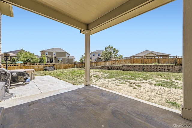 785 Iris St, Brighton, CO 80601 - fenced backyard featuring a patio area