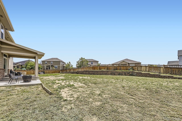 785 Iris St, Brighton, CO 80601 - fenced backyard with a patio area