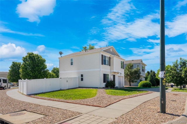 4528 Andes St, Denver, CO 80249 - view of property exterior with an attached garage