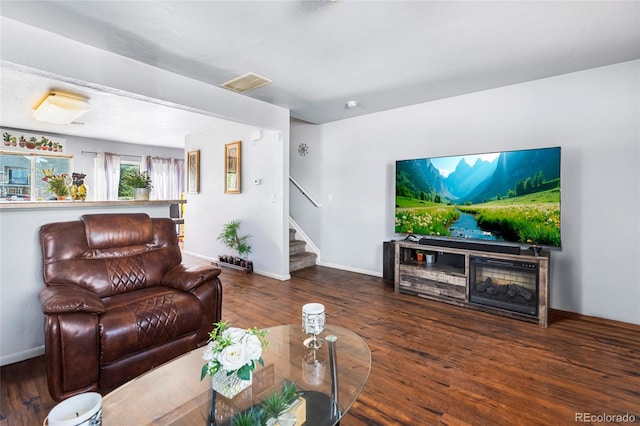 4528 Andes St, Denver, CO 80249 - living room featuring stairway, wood finished floors, and baseboards