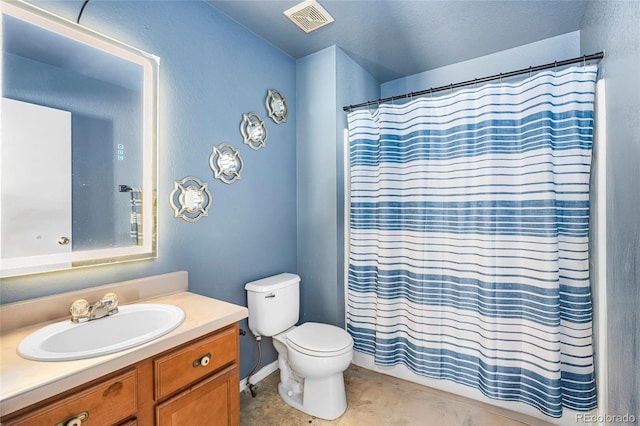 4528 Andes St, Denver, CO 80249 - full bathroom featuring toilet, vanity, and a shower with shower curtain