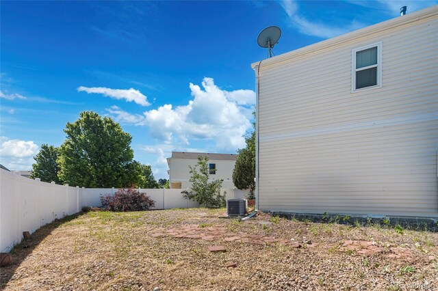 4528 Andes St, Denver, CO 80249 - fenced backyard with cooling unit